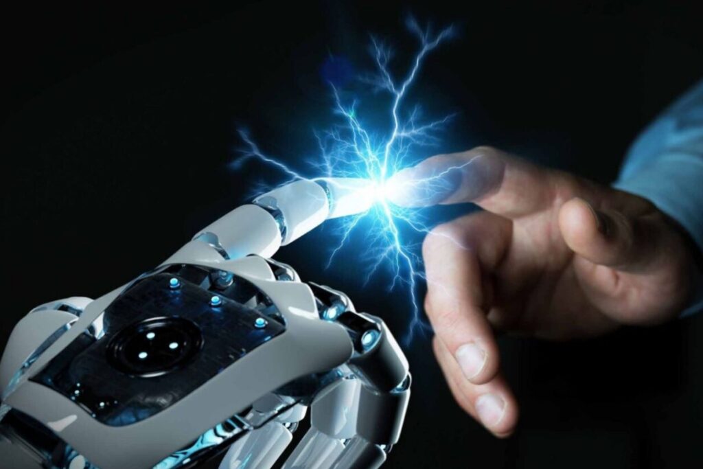 AI-Enhanced Recruitment: a robotic hand and a human hand reaching toward each other, symbolising the balance between AI and human judgement.